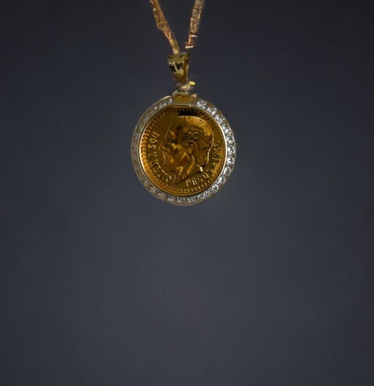 Pendant Currency 14kt $140